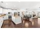 Spacious kitchen with white cabinets, granite counters, and stainless steel appliances at 164 Goshen Ln, Woodstock, GA 30188