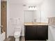 Modern bathroom with a shower, vanity, and commode at 170 Boulevard Se # E411, Atlanta, GA 30312