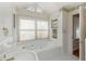 Bathroom featuring a jetted tub and ample natural light at 4750 Rebel Trl, Atlanta, GA 30327