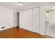 Well-lit bedroom with hardwood floors and built-in closets at 4750 Rebel Trl, Atlanta, GA 30327