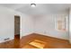 Bright bedroom with hardwood floors and a closet at 4750 Rebel Trl, Atlanta, GA 30327