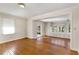 Spacious living area with hardwood floors and built-in shelving at 4750 Rebel Trl, Atlanta, GA 30327