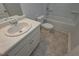 Bathroom with single sink vanity, toilet and tub shower at 48 Beaver Pt, Villa Rica, GA 30180