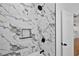Modern bathroom with marble shower, updated fixtures and a sleek design at 1273 Oakland Sw Ter, Atlanta, GA 30310