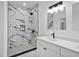 Spa-like bathroom with a large marble shower and updated vanity at 1273 Oakland Sw Ter, Atlanta, GA 30310