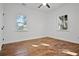 Spacious bedroom with hardwood floors and two large windows at 1273 Oakland Sw Ter, Atlanta, GA 30310