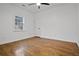 Well-lit bedroom featuring hardwood floors and ample closet space at 1273 Oakland Sw Ter, Atlanta, GA 30310