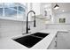 Modern kitchen with black sink and gooseneck faucet at 1273 Oakland Sw Ter, Atlanta, GA 30310