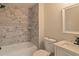 Updated bathroom with marble tile shower and bathtub at 204 Elm St, Palmetto, GA 30268