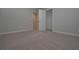 Spacious bedroom with neutral walls and carpet flooring at 16 Deer Place, Villa Rica, GA 30180