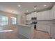 Modern kitchen with white cabinets, granite countertops, and island at 16 Deer Place, Villa Rica, GA 30180