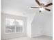 Large bedroom with window, ceiling fan and attic access at 3012 Lexington Ave, Woodstock, GA 30189