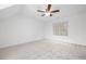 Bright bedroom with ceiling fan, window, and neutral carpet at 3012 Lexington Ave, Woodstock, GA 30189