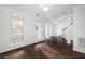 Bright dining room with hardwood floors and large windows at 3012 Lexington Ave, Woodstock, GA 30189