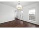 Bright dining room features hardwood floors and neutral walls at 3012 Lexington Ave, Woodstock, GA 30189