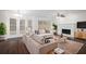 Living Room with hardwood floors, fireplace and french doors at 3012 Lexington Ave, Woodstock, GA 30189