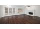 Living room with hardwood floors, fireplace and lots of natural light at 3012 Lexington Ave, Woodstock, GA 30189