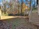 Backyard with deck and stairs leading to the yard at 4925 Erin Rd, Atlanta, GA 30331