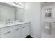 Modern bathroom with double vanity and toilet at 4925 Erin Rd, Atlanta, GA 30331