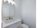 Updated bathroom with white vanity and modern fixtures at 4925 Erin Rd, Atlanta, GA 30331