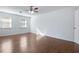 Well-lit bedroom with hardwood floors and ceiling fan at 4925 Erin Rd, Atlanta, GA 30331