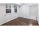 Spacious bedroom with hardwood floors and ample natural light at 4925 Erin Rd, Atlanta, GA 30331