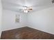 Bright bedroom with hardwood floors and ceiling fan at 4925 Erin Rd, Atlanta, GA 30331