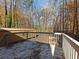 Wooden deck overlooking wooded backyard at 4925 Erin Rd, Atlanta, GA 30331