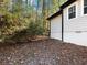 Side of house with wooded backyard at 4925 Erin Rd, Atlanta, GA 30331