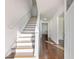 Bright entryway with hardwood floors and staircase at 4925 Erin Rd, Atlanta, GA 30331