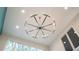 Modern, circular chandelier with metallic finish at 4225 Maner Street Se, Smyrna, GA 30080