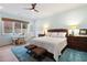 Spacious main bedroom with light blue walls and wicker furniture at 4225 Maner Street Se, Smyrna, GA 30080