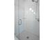 Walk-in shower with white subway tile and glass door at 4225 Maner Se St, Smyrna, GA 30080