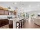 Modern kitchen with granite countertops, an island, and stainless steel appliances at 4410 Chaney Ct, Cumming, GA 30028