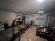 Garage with storage and exercise equipment at 5993 Springfair Run, Lithonia, GA 30038