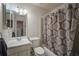 Bathroom with a shower/tub, vanity and white decor at 6711 Witherington Ct, Norcross, GA 30093