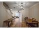 Bright dining room with hardwood floors and access to living room at 6711 Witherington Ct, Norcross, GA 30093