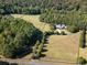 Aerial view of house and expansive property at 75 Rivercreek Xing, Kingston, GA 30145