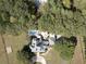 Beautiful aerial view of the estate property with a swimming pool, backyard, and lush landscaping at 75 Rivercreek Xing, Kingston, GA 30145