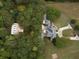 Stunning aerial view of this beautiful estate property with lush landscaping at 75 Rivercreek Xing, Kingston, GA 30145