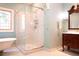 Elegant bathroom features marble shower, stained-glass window, and claw-foot tub at 75 Rivercreek Xing, Kingston, GA 30145
