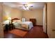 Cozy bedroom with ceiling fan and window coverings at 75 Rivercreek Xing, Kingston, GA 30145