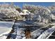 Snow covered front yard with house and dog at 75 Rivercreek Xing, Kingston, GA 30145