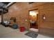 Barn interior showing the washroom and entrance to a horse stall with wood walls at 75 Rivercreek Xing, Kingston, GA 30145