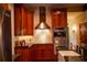 Well-equipped kitchen featuring stainless steel appliances, subway tile backsplash, and wood cabinetry at 75 Rivercreek Xing, Kingston, GA 30145