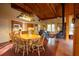 Open concept kitchen and dining area, featuring wood floors and ample lighting at 75 Rivercreek Xing, Kingston, GA 30145
