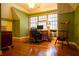 Office space with hardwood floor, two desks, and natural light at 75 Rivercreek Xing, Kingston, GA 30145