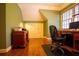Spacious office with hardwood floor, storage closet, and natural light at 75 Rivercreek Xing, Kingston, GA 30145