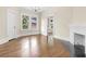 Formal dining room with hardwood floors and a white fireplace at 776 Brookline Sw St, Atlanta, GA 30310