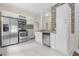 Modern kitchen with stainless steel appliances and white cabinets at 776 Brookline Sw St, Atlanta, GA 30310